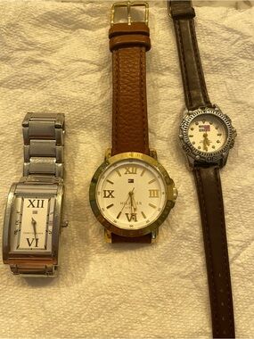 3 Tommy Hilfiger watches. 2 men’s and one womens
